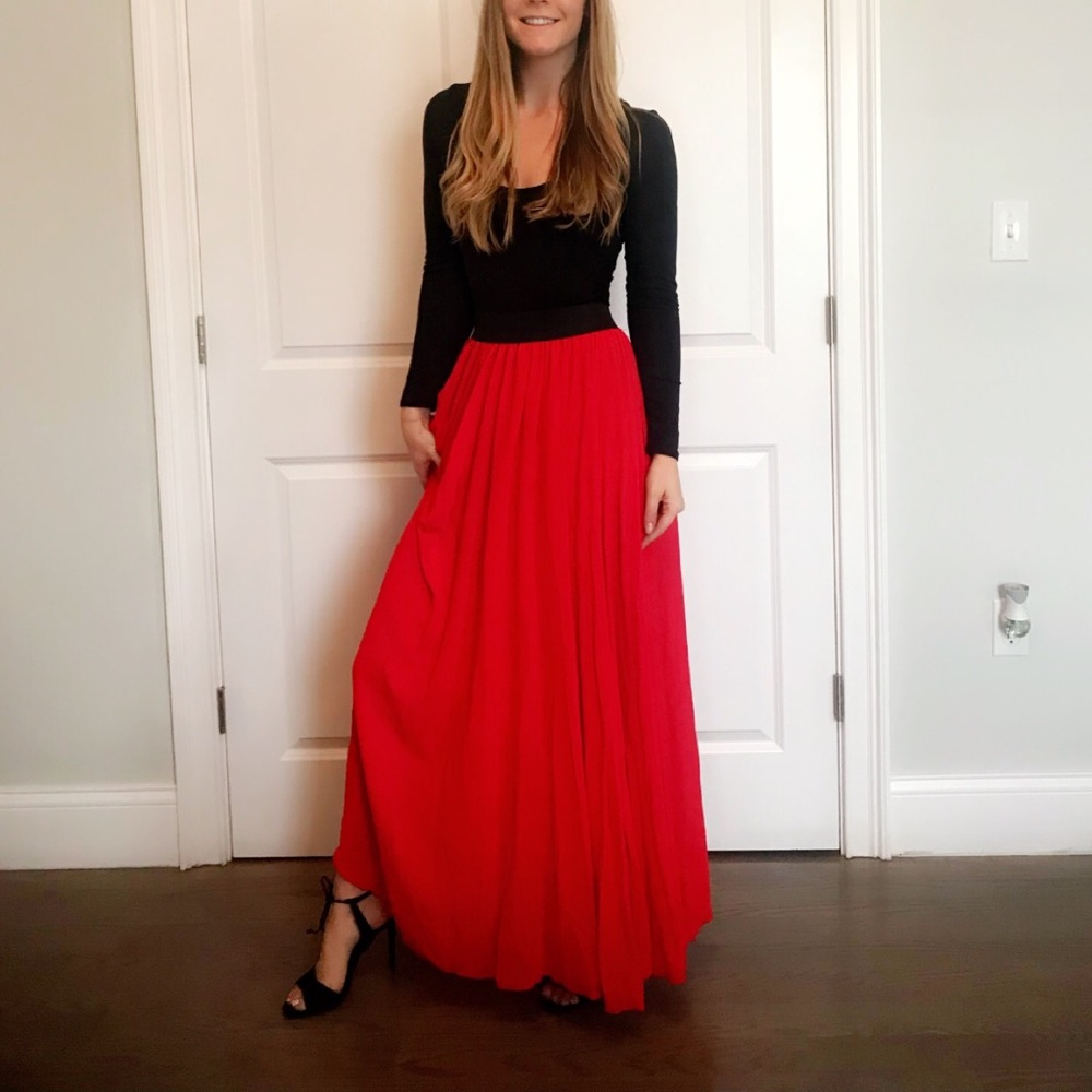 Floor length red maxi skirt with black band